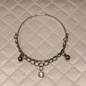 Silver bangle with chain